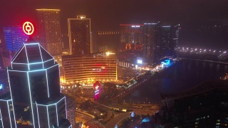 夜间灯光照亮澳门市区街景4k中国航拍全景图视频素材模板下载
