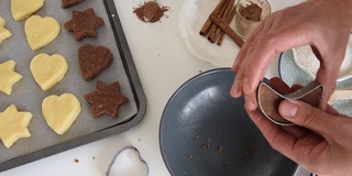 妇女用米粉制作健康饼干。自制，假日烘焙主题，个人观点