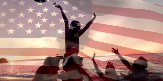 一群朋友在海滩上庆祝7月4日的美国国旗。