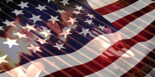 火烤架和美国国旗庆祝独立日。