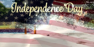 游泳池里的朋友和美国国旗上写着7月4日独立日的文字。