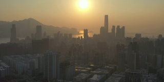 Aerial view of Kowloon and Hong Kong Island in sunset