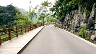 View of Car drive on mountain road,Guizhou,China.视频素材模板下载