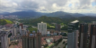 白天深圳城市景观山部分航拍全景4k倾斜转移中国
