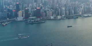 4K时间推移:香港维多利亚港的白天到夜晚的黄昏