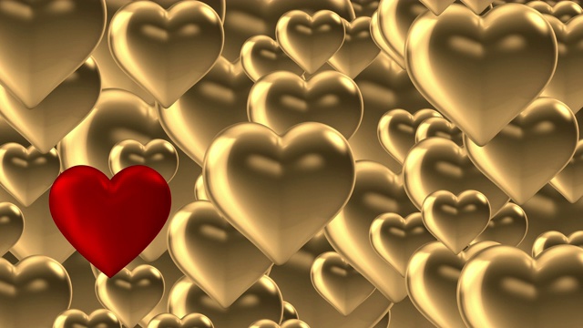 情人节的概念;喷出金色的心。