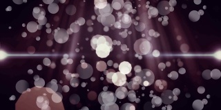 泡沫移动。两个闪亮的大泡泡在视频中心交叉。背板上有发光的光线