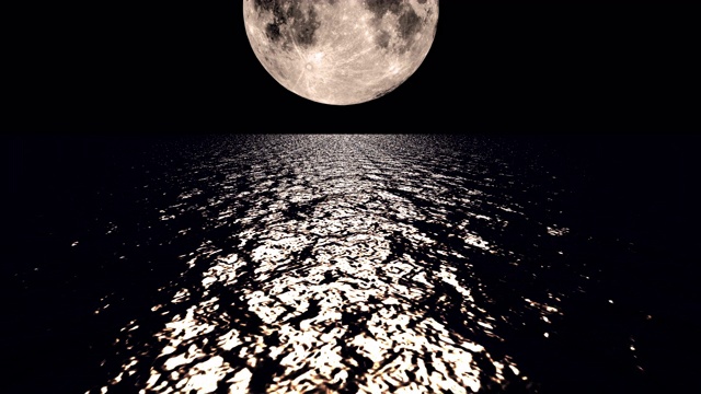 夜晚，深褐色的月亮在海面上缓缓落下