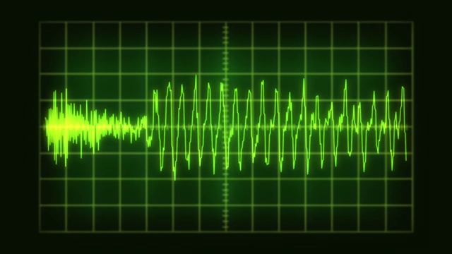 在发光的复古CRT示波器上显示的音频波形