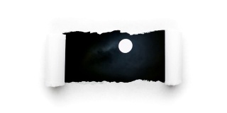 这是一段充满创意的4k时长的视频，视频中，夜空中一轮闪亮的满月和漂浮的云，通过一个白色纸上的边缘撕裂的洞可以看到。