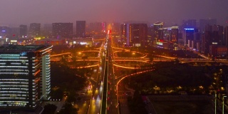 日落时间夜晚照亮成都城市中心交通街道道路航拍时间推移全景4k中国