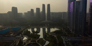 日落时间成都著名的国家金融中心区公园湖航拍时间全景4k中国