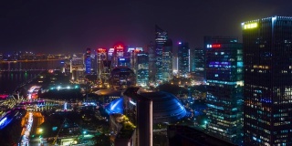 夜景照明杭州市区著名的现代滨江湾市区航拍延时全景4k中国