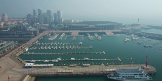 晴天青岛著名的奥林匹克湾广场游艇码头航拍全景4k中国
