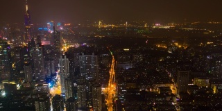 飞越南京市中心夜间照明城市景观交通街道湖区空中延时全景4k中国