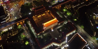 中国西安航空时间推移夜v1圆形鸟眼TL围绕南城墙入口。