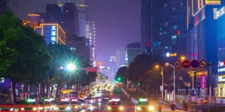 长沙市市中心夜间照明著名交通街道十字路口全景时间间隔4k中国