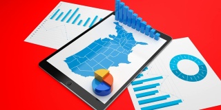 增长的财务图表和图表在平板电脑在美国在红色的背景