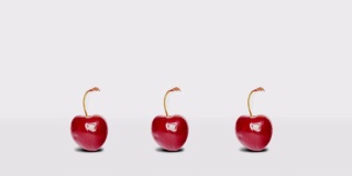 3个快乐跳跃的樱桃在一排动画