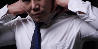 亚洲商务人士穿着得体。中国男人穿西装打领带。商务人士的概念、时尚传统和服饰文化。