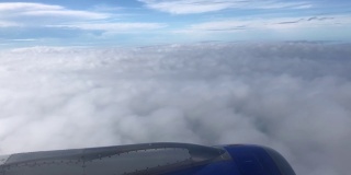 Amazing view of the blue sky from the plane flying over the clouds in MP4 HD format