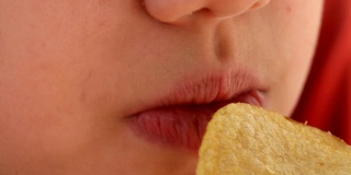 girl eating potato chips