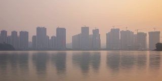 日落时间长沙城市湖泊海岸线巨型建设现代码头全景时间间隔4k中国