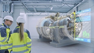 工业4.0:两名工程师站在工厂车间，用增强现实3D模型引擎交谈，分析组件，燃料使用效率。特效特效，图形可视化视频素材模板下载