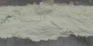 Production of cottage cheese at the factory . Dairy-based cream products..