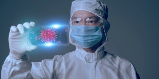 医学科学家冠状病毒疫苗研究人员戴口罩和穿着智能移动病毒分析，医学实验室物联网技术AI移动医疗数字化未来展示。