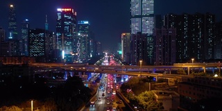 夜景时间照亮广州市中心繁忙交通街道路口航拍全景4k中国