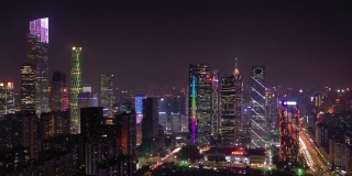 夜间灯光照亮广州市市中心区交通街道航拍全景4k中国
