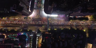 广州市中心城区夜景时间灯火通明，繁忙的交通街道十字路口高空俯视图4k中国