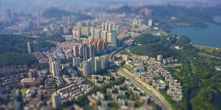 阳光明媚的一天深圳城市景观生活街区航拍全景4k倾斜转移中国