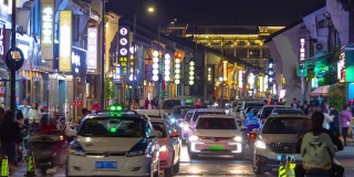 杭州城夜景时间照亮了著名的购物、交通、街道边全景，时间跨度为4k中国