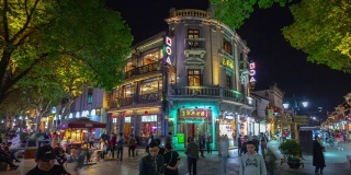 杭州市夜景时间照亮了中国著名的步行街十字路口全景，时间跨度为4k
