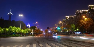 南京城夜景时间照亮了著名的体育场区交通街道时间跨度全景4k中国