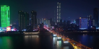 夜景照亮长沙市市中心滨江交通大桥街道道路航拍全景4k中国