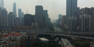 白天的雾霾广州市区交通街道航拍全景4k中国
