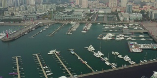 白天青岛著名海湾游艇码头航拍全景4k中国