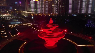 夜光青岛市著名纪念碑广场高空俯视4k中国全景视频素材模板下载