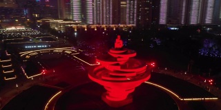 夜光青岛市著名纪念碑广场高空俯视4k中国全景