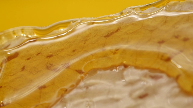 Close-up of honey falling