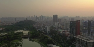 日落时分佛山市中心著名公园滨江湾高空俯仰全景4k中国