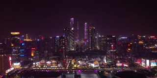 夜景时间照亮了广州市区，4k中国体育地面航拍全景图