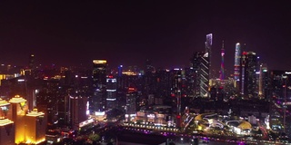 夜景时间照亮广州市市中心著名商场、交通街道航拍全景4k中国