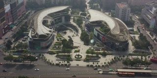 晴天雾霾广州市中心著名商场交通街道高空俯视图4k中国