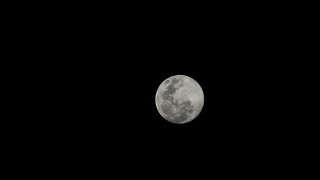 近端超级长焦镜头拍摄满月。视频素材模板下载