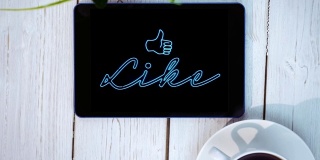动画的蓝色霓虹风格的字喜欢与一个图标闪烁在屏幕上的数字平板电脑