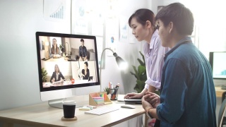 亚洲商务人员与办公室团队进行视频会议视频素材模板下载